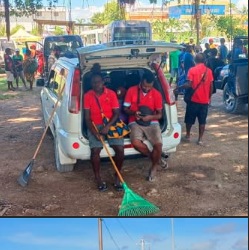 Team members taking part in a Madang community clean-up